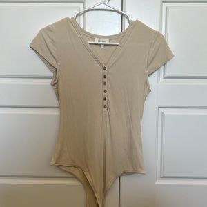 Tan body suit